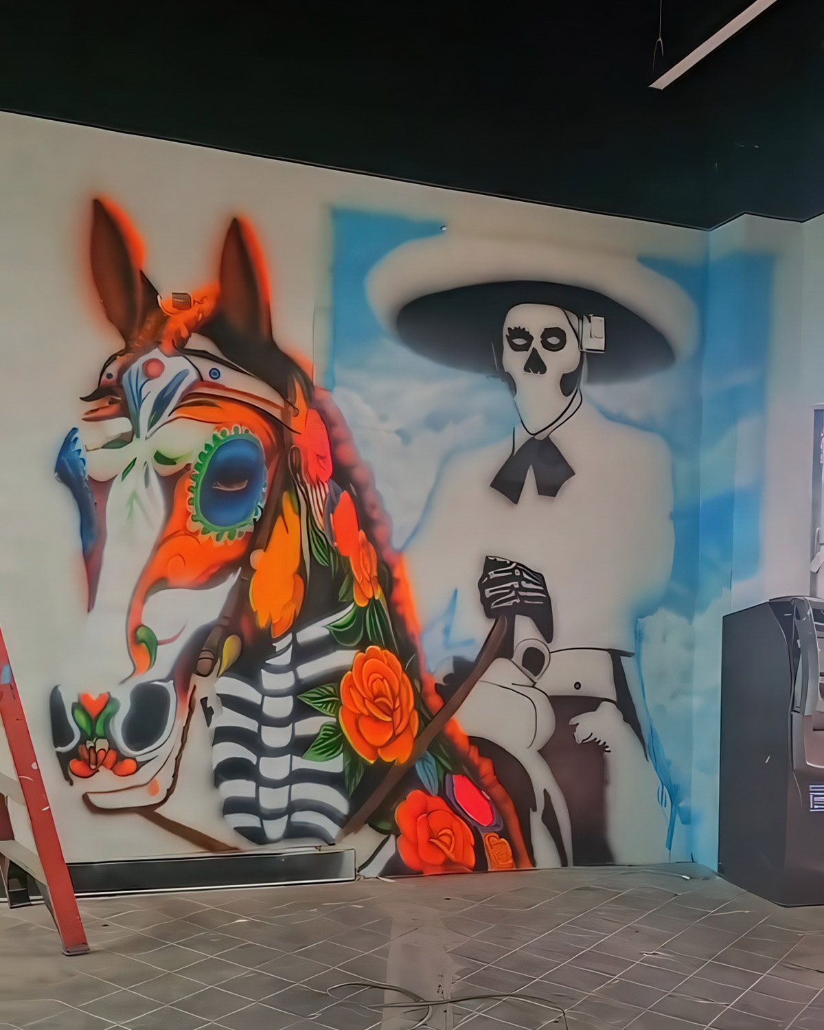 A finished Day of the Dead mural by La Sombra Art Studio