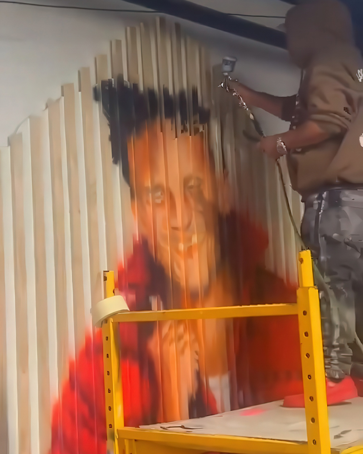 A mural sketched and taking shape at La Sombra Art Studio